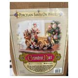 Grandeur Noel Porcelain Santa On Wheels Collector