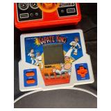 Tiger Electronics Handheld Game Lot of 4: Jordan Vs Bird, Miniature Golf, Karate King & Drive Yourself Crazy