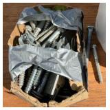 assorted bucket of staples and screws