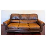 K - Brown Leather Sofa by Superb Creation Ltd.