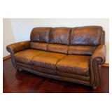 K - Brown Leather Sofa by Superb Creation Ltd.