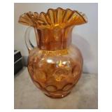 Amber Carnival Glass Pitcher with Ruffled Rim and Clear Handle