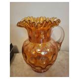 Amber Carnival Glass Pitcher with Ruffled Rim and Clear Handle