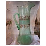 Three Glass Pitchers with Floral and Scroll Patterns (Lot of 3)