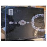 Coffee table books: Assouline Elizabeth Taylor My Love Affair with Jewelry; Barbra Streisand My Passion for Style