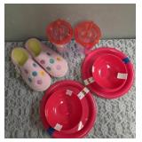 2 sets of Plastic Red Plates (4 in each set) and 2 sets of Plastic Red Bowls (4 in each set). 2- Party Time Tumblers, and Ladies Slippers Size 7-8