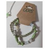 Necklace , Earrings, Bracelet stretches..  Seaside green color.