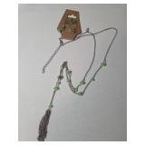 Necklace , Earrings, Bracelet stretches..  Seaside green color.
