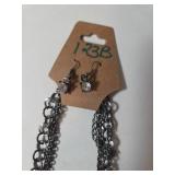 Necklace , Earrings, Bracelet.  Shades of black.