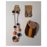 Necklace , Earrings, Bracelet.  Shades of orange and brown.