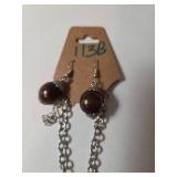 Necklace , Earrings, Bracelet.  Shades of orange and brown.