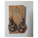 Necklace , Earrings, Bracelet.  Shades of orange and brown.