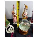 Assorted Christmas Ceramic Figurines & Glass Snow Globes - Snowmen, Santa & Nativity Scenes