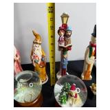 Assorted Christmas Ceramic Figurines & Glass Snow Globes - Snowmen, Santa & Nativity Scenes