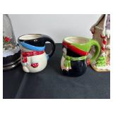 Assorted Christmas Decor - Snow Globes, Snowman Mugs & Gingerbread House