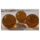 Three Vintage Amber Glass Paperweights