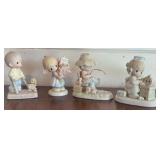 4 Precious Moments Figurines