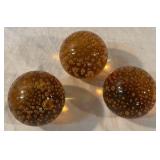 Three Vintage Amber Glass Paperweights