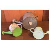 Three Watering Cans