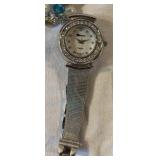 Three Vintage Watches and a Watch band