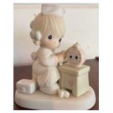 4 Precious Moments Figurines