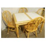 Light Oak Dining Set. Table is 36"x45" with white tile inlay, flip-up leaf (15"), and 4 chairs