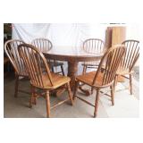 Oak Dining Room table 47" diameter with 6 chairs & 2 leaves (11.5" wide each)