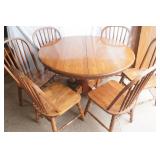 Oak Dining Room table 47" diameter with 6 chairs & 2 leaves (11.5" wide each)