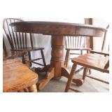 Oak Dining Room table 47" diameter with 6 chairs & 2 leaves (11.5" wide each)