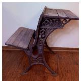Antique School Desk with Ornate Cast Iron Supports and Foldable Wooden Seat