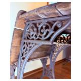 Antique School Desk with Ornate Cast Iron Supports and Foldable Wooden Seat