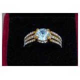 Gold Tone Ring with Light Blue Stone