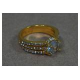 Gold Tone Ring with Light Blue Stone