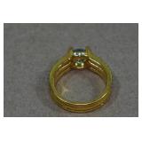 Gold Tone Ring with Light Blue Stone