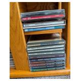 Wood CD Storage Cabinet With Assorted Compact Discs