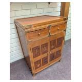 Asian-Style Wood Accent Cabinet With Carved Doors