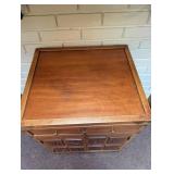 Asian-Style Wood Accent Cabinet With Carved Doors