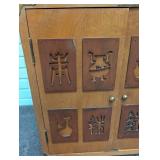 Asian-Style Wood Accent Cabinet With Carved Doors