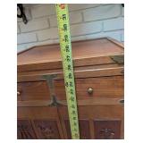 Asian-Style Wood Accent Cabinet With Carved Doors