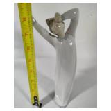 Two Lladro Figurines "Boy Awakening" #4870 & "Girl with Candle" #4868