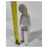 Two Lladro Figurines "Boy Awakening" #4870 & "Girl with Candle" #4868
