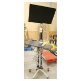 Portable computer stand/cart with monitor and power strip