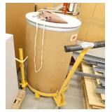 Barrel lift cart and empty cardboard barrel