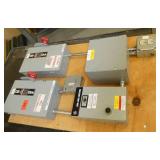 Electrical switches mounted on plywood