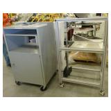 Two rolling metal shelf/cabinets