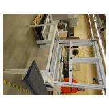 Steel frame, adjustable height workbench with laminate top and wired with electrical outlets 120V plugs