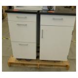 Two heavy steel rolling cabinets 19x24x34 One of each style