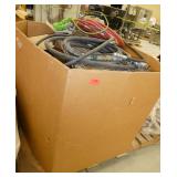 Gaylord pallet with an assembled wire shelf, air hoses and misc