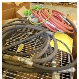 Gaylord pallet with an assembled wire shelf, air hoses and misc