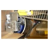 Gaylord pallet with an assembled wire shelf, air hoses and misc
